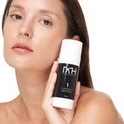 Model with clear skin holding Cleanse & Refresh, a premium skincare product by Mel Hornery Cosmetics.