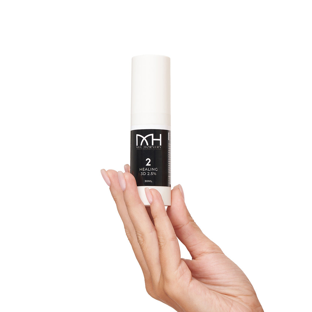 Hands holding Healing 3D, a premium skincare product by Mel Hornery Cosmetics.