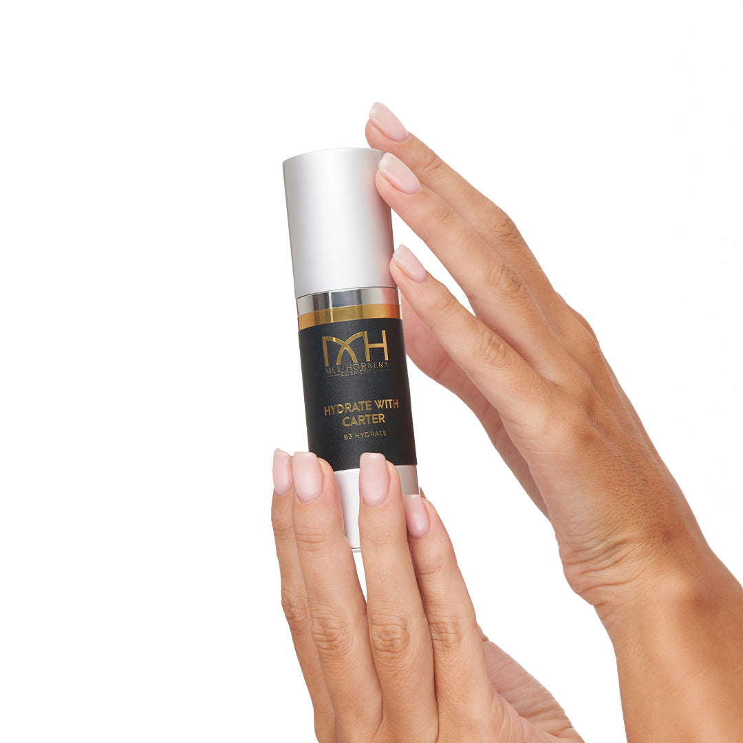 hands holding hydrate with carter, a premium skincare product by Mel Hornery Cosmetics.