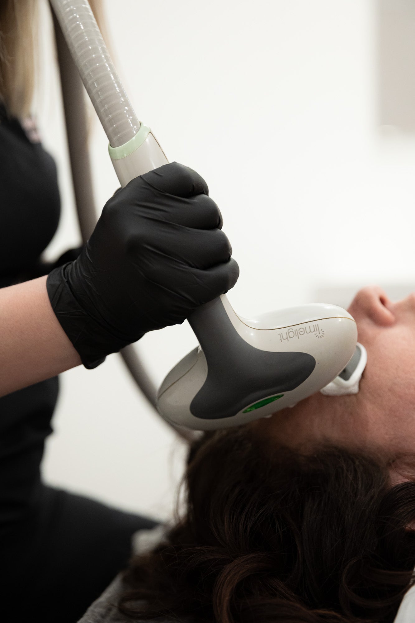 Mel Hornery, owner of Mel Hornery Cosmetics, expertly administering laser to a model in one of the leading skin clinics.