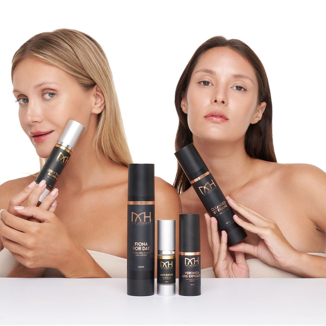 A model holds an oily skin bundle, a skincare product by Mel Hornery Cosmetics, in a bright, clean setting, highlighting the "skin clinic near me" experience.