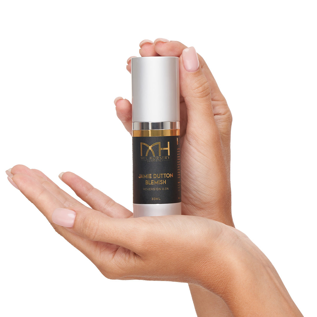 hands holding jamie dutton blemish, a premium skincare product by Mel Hornery Cosmetics.